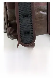 Detail of S-shaped ergonomic padded shoulder straps with breathable mesh and leather