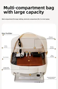 Detail showing internal compartments of the beige laptop backpack for 15.6 inch devices