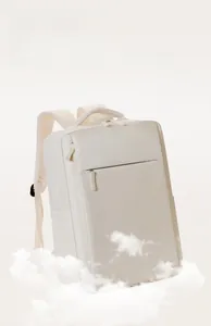 Detail of breathable honeycomb mesh shoulder straps on cream minimalist backpack