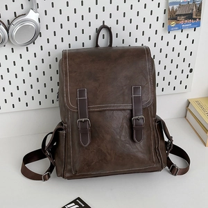 Vintage brown PU leather backpack with contrast stitching and buckle flap for daily travel