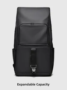 Detail of matte black waterproof backpack showing the expandable storage function