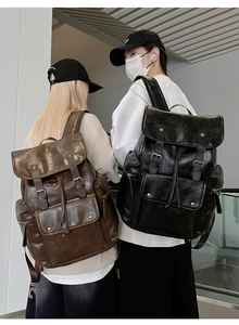 Dual view of vintage PU leather backpacks showing large capacity and buckle closure details