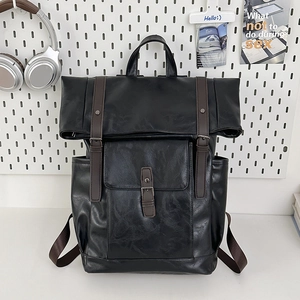 Retro black PU leather backpack with brown straps and large capacity for travel and school