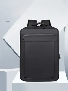 Detail of minimalist business backpack featuring external USB charging port and sleek black fabric