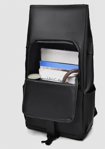 Detail of black business backpack showing interior laptop compartment and organized storage
