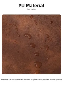Close-up of brown PU leather texture showing water repellent surface and droplets