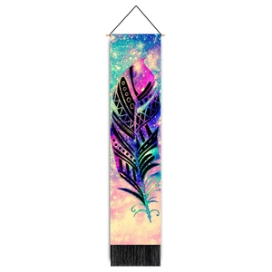 Detail of colorful starry feather tapestry with black silk tassels and wooden hanging rod