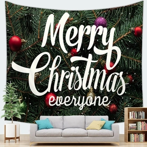 Festive Merry Christmas tapestry with green pine branches and colorful ornaments over a sofa
