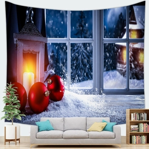 Detail of Christmas tree tapestry showing vintage lantern and red ornaments in a cozy room