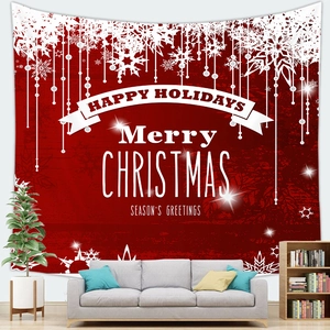 Detail of Christmas snowflake tapestry hanging in a cozy modern living room setting