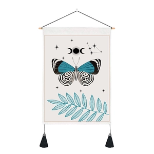 Macro view of vintage butterfly tapestry texture with wooden rod and black tassels