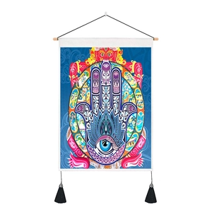 Detailed Hamsa Hand wall tapestry featuring intricate cultural art and black tassels