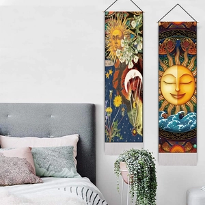 Detail of Nordic retro sun and moon tapestries with hanging rods on a minimalist wall