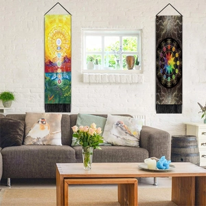 Detail view of chakra symbols and geometric mandala tapestries with black tassels