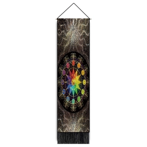 Detail of meditation tapestry featuring rainbow mandala, wooden rod and black fringe tassel