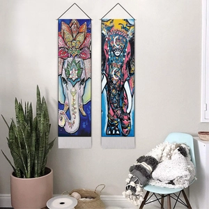 Vibrant Indian elephant mandala tapestry set with wooden hangers and bohemian room decor