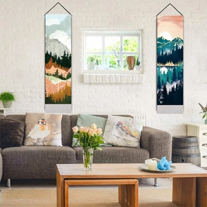Vertical landscape wall scrolls featuring modern mountain art on textured white brick walls