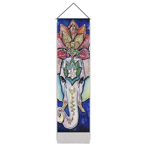 Bohemian Indian elephant wall tapestry with vibrant patterns on deep blue fabric canvas
