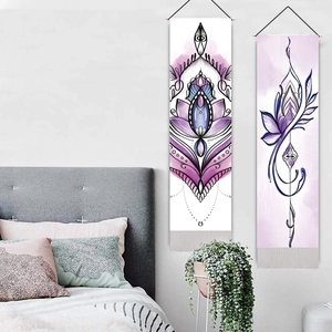 Set of two bohemian lotus mandala wall tapestries hanging in a minimalist bedroom decor