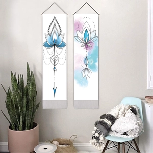 Bohemian lotus mandala wall tapestries set with hanging ropes in a modern living room