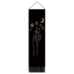 Vertical wall tapestry with minimalist moon and floral line art on black canvas