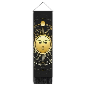 Vertical black wall hanging with gold sun motifs, wooden pole and elegant tassels