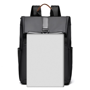 Detail of minimalist business laptop backpack with laptop model for size reference