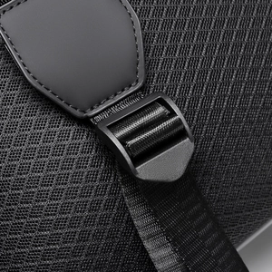 Macro detail of breathable mesh fabric and durable plastic buckle on black backpack