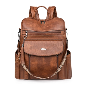 Vintage brown PU leather backpack for women with large capacity and ethnic strap