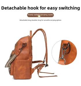Detail view of leopard print backpack showing detachable metal hooks and textured leather