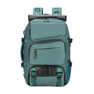 Large teal travel backpack with waterproof nylon, multi-pockets, and reinforced base