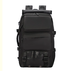 Large capacity black waterproof travel backpack with roll-top design and multiple pockets