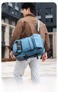 Detail of blue nylon travel backpack featuring side mesh pockets and adjustable straps