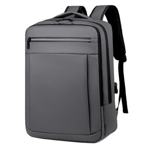Dark grey waterproof business laptop backpack with USB port shown at a 45-degree angle