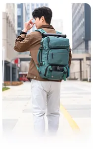 Side view of large capacity waterproof travel backpack with multiple functional pockets