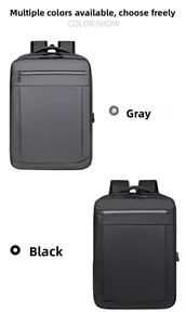 Close-up of grey and black business backpacks with USB charging port and multi-layer storage