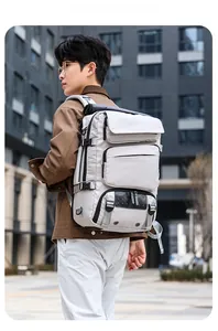 Close-up of lightweight travel backpack featuring multi-pocket design and durable nylon fabric