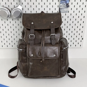 Deep brown vintage PU leather backpack with drawstring closure and front buckle pockets