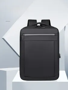 Detail of minimalist business backpack featuring a side USB charging port and zipper pocket