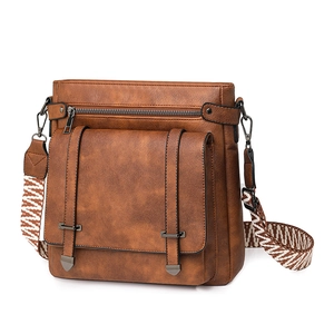 Vintage brown leather crossbody bucket bag with geometric jacquard strap and large capacity