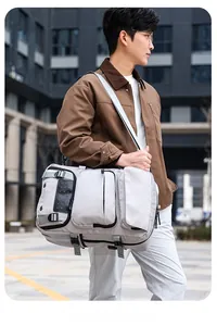 Side view of lightweight light grey travel backpack featuring multi-functional zip compartments