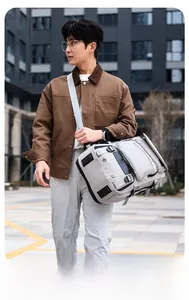 Close-up of a large capacity light grey travel backpack with multi-functional utility pockets