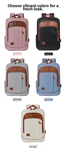 Business backpack set in pink, black, grey, blue, and white with USB charging port