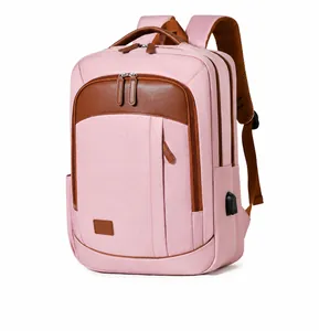Detailed side view of pink business backpack featuring brown leather trim and USB port