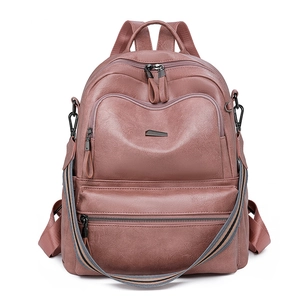 Dusty pink multi-pocket faux leather backpack with detachable striped shoulder strap