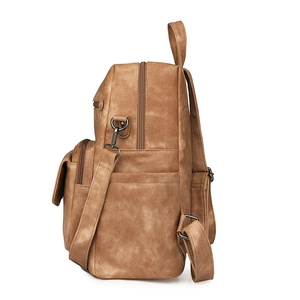 Mochila vintage de cuero PU marrón con correas ajustables y bolsillos laterales, vista lateral