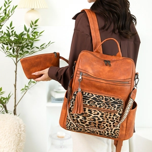 Chic leopard print backpack set with caramel faux leather and matching clutch bag