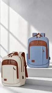 Detail of dual-color commute backpacks showing USB port and premium leather accents