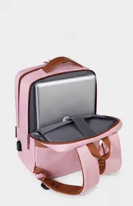 Internal view of a pink laptop backpack showing a padded compartment with a 14-inch notebook