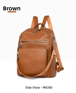 Close-up side view of a brown pebbled PU leather backpack with multiple zipper compartments